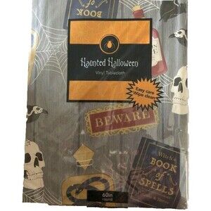 Halloween Vinyl Tablecloth 60" Rd Flannel Backed Skull Webs Spells Goblin Bats